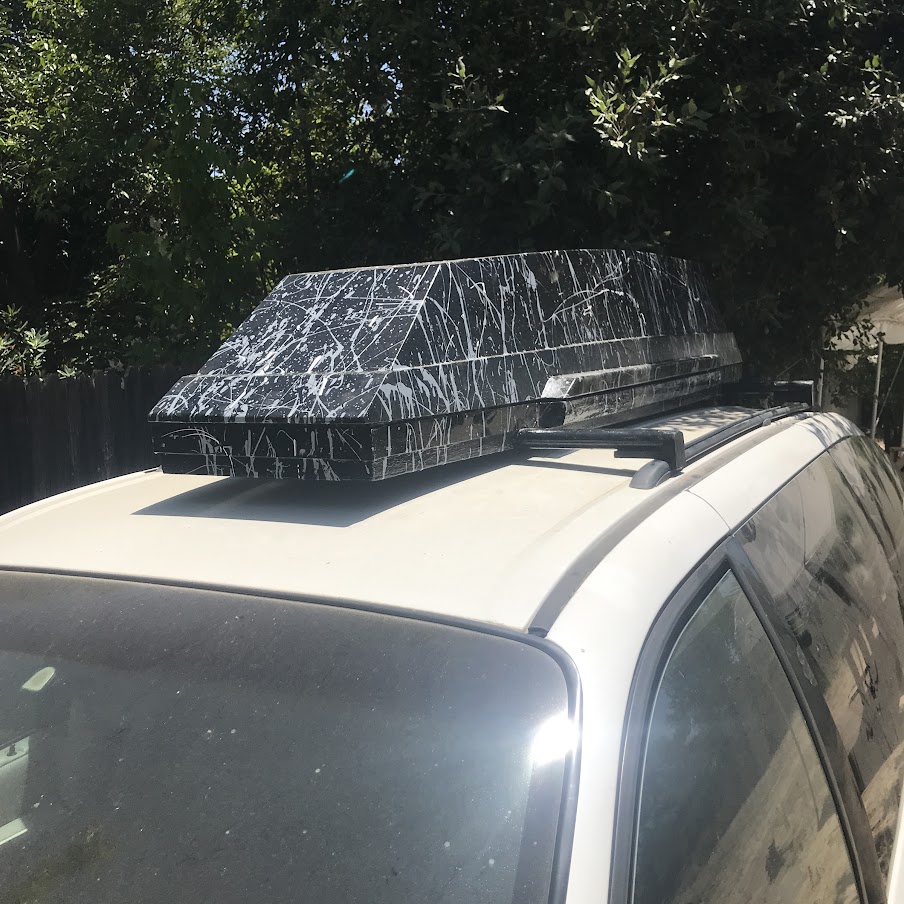 Roof rack car carrier made of plywood